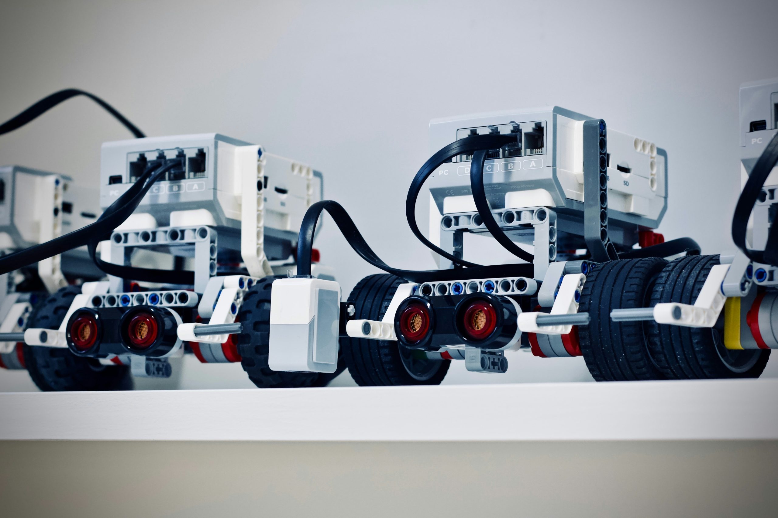 Two small grey robots.