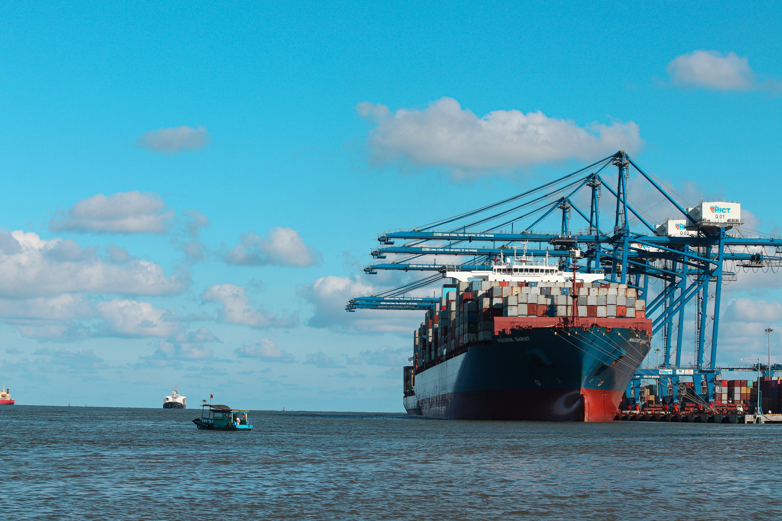 A ship being loaded at a port.