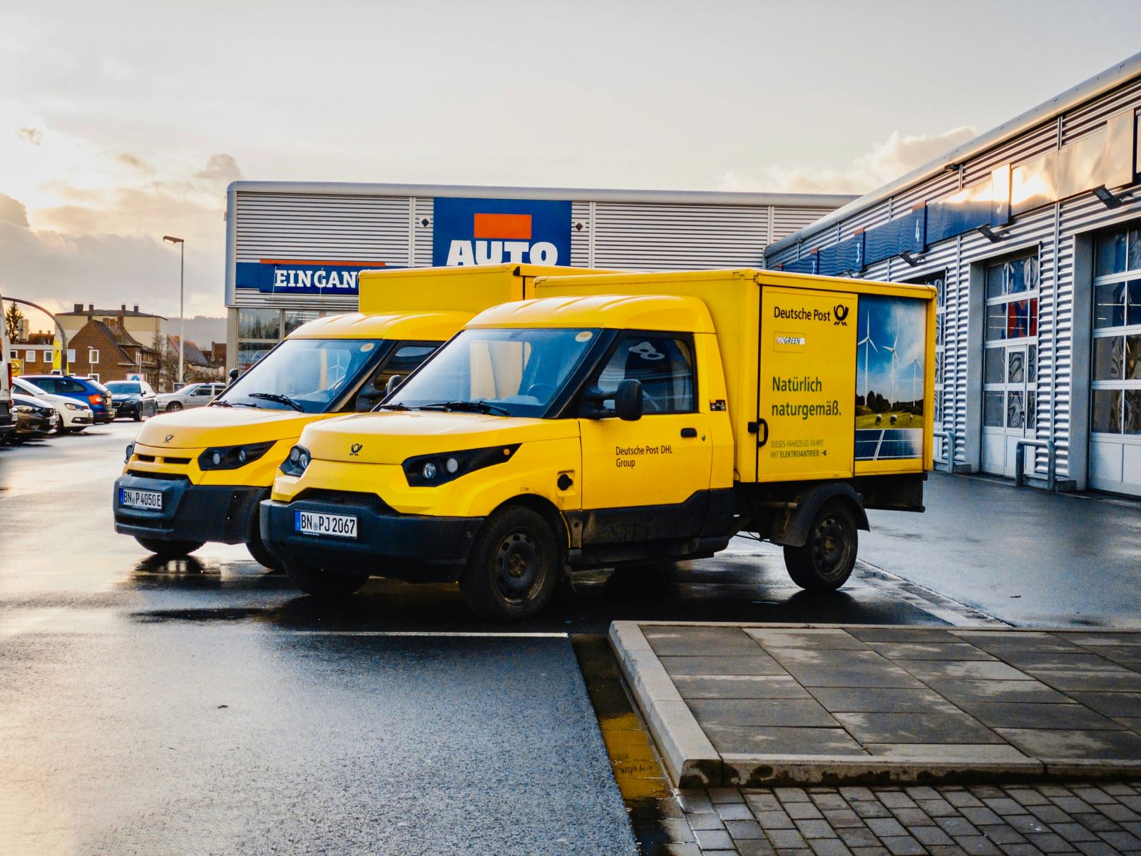 A row of parked delivery vans.