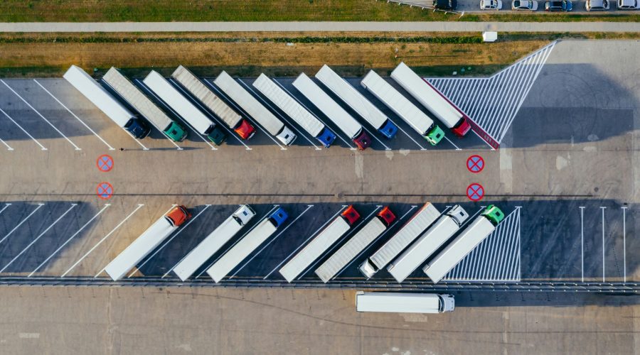 Rows of parked delivery vans.