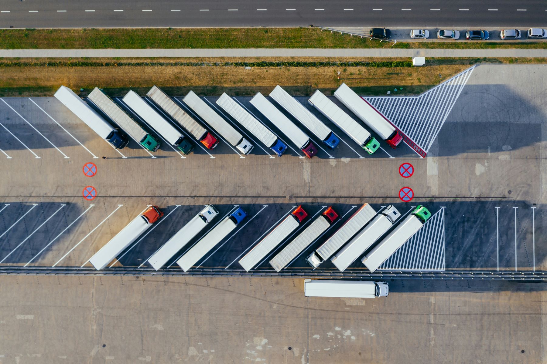 Rows of parked delivery vans.